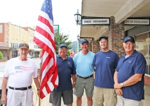 Kiwanis Club members (from left) Jim Wilson, Danny Smith, Tim Broyles, David LeVeau, and Bill Kyte are some of the members who distribute flags on national holidays throughout Elizabethton.